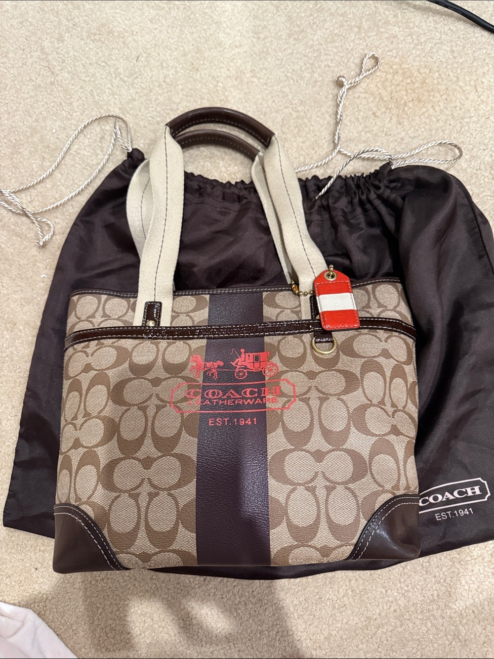 COACH Brown Signature Canvas Tote with Red Logo Accent